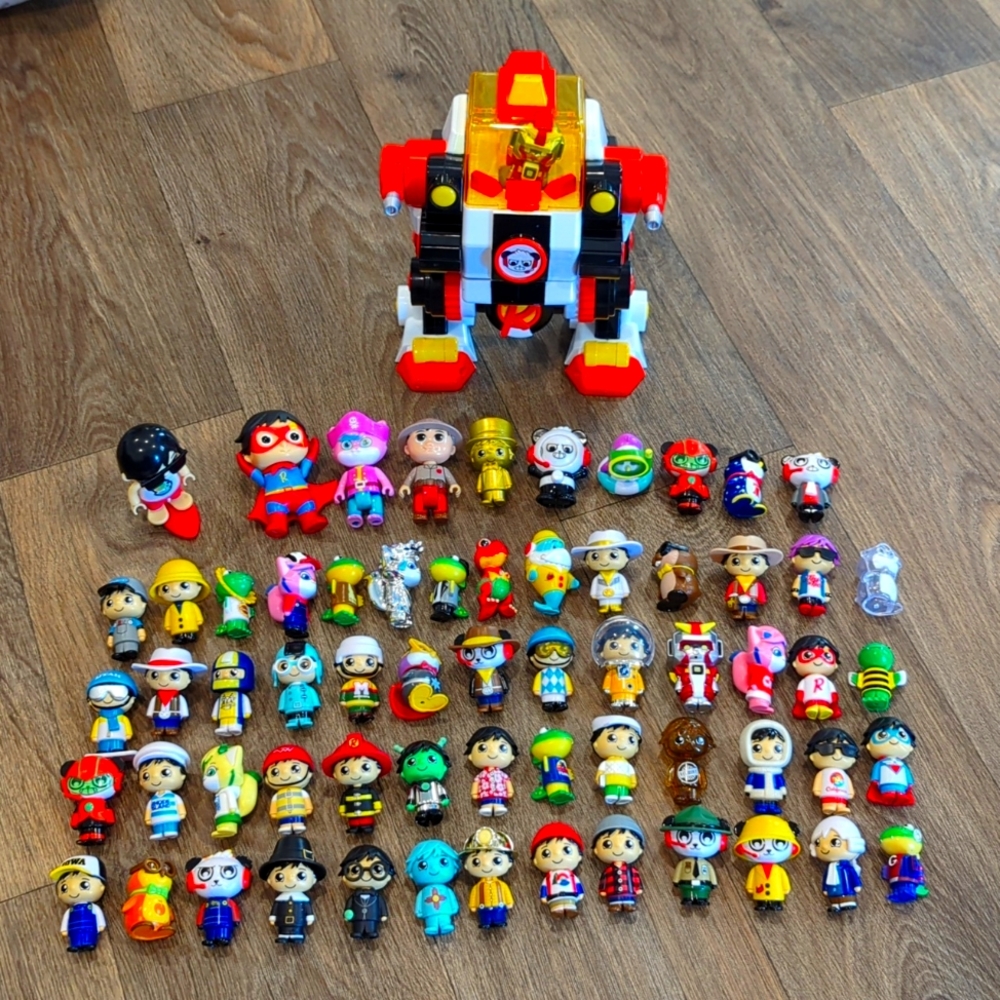 Ryan's World Road Trip figures, Ryan Robot, and other figures